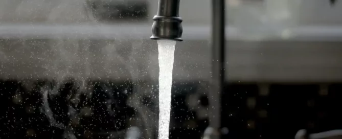 water faucet running hot water