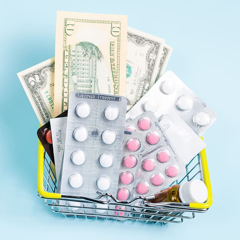 basket with pills and money