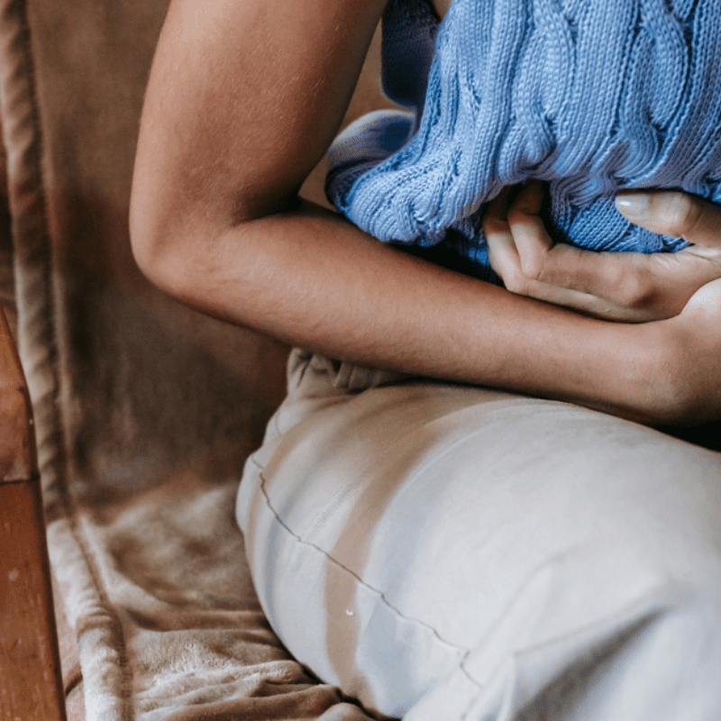 a woman feels nausea in humid weather