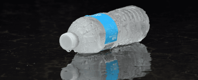 bottled water with its reflection