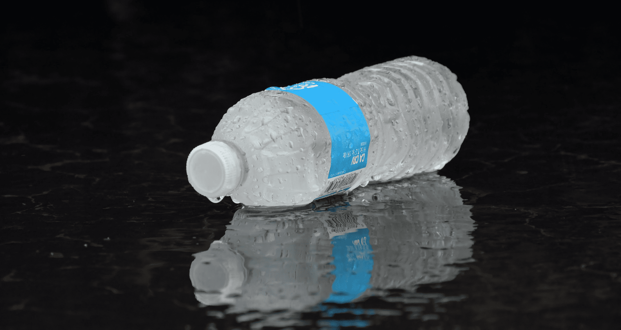 bottled water with its reflection