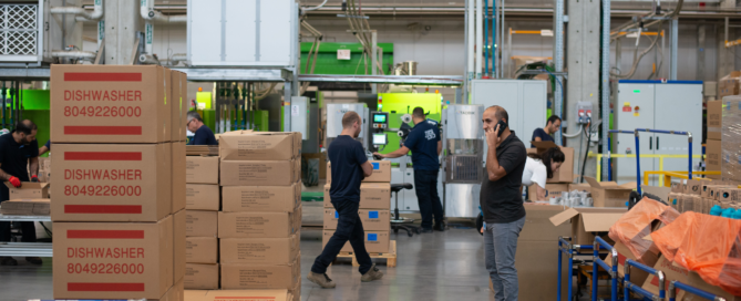 warehouse staff hard in a bustling warehouse space