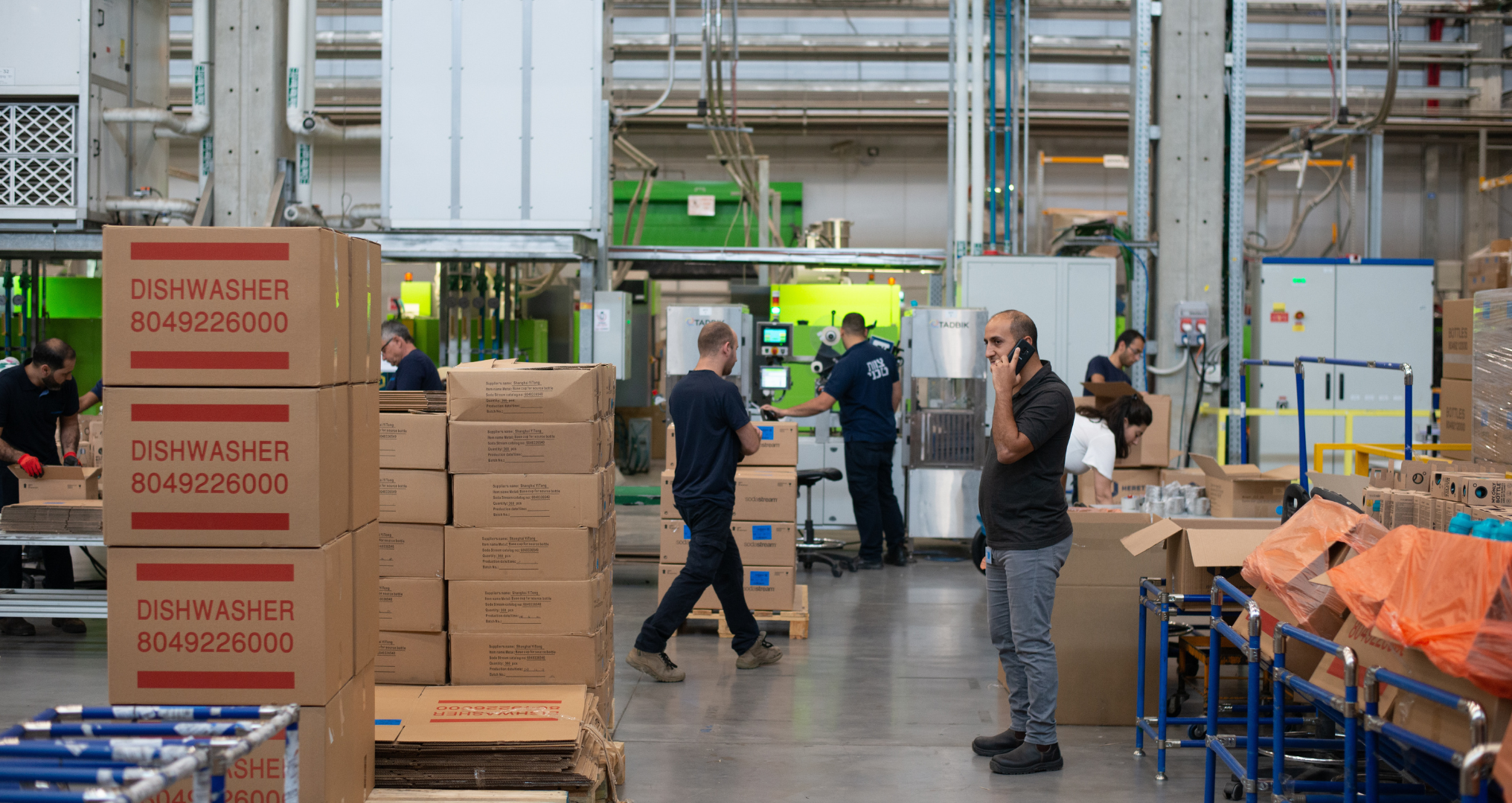 warehouse staff hard in a bustling warehouse space
