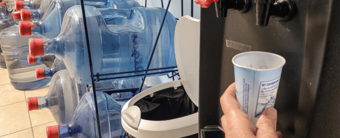 plastic jug water cooler in office - a sign you’re ready to go bottleless