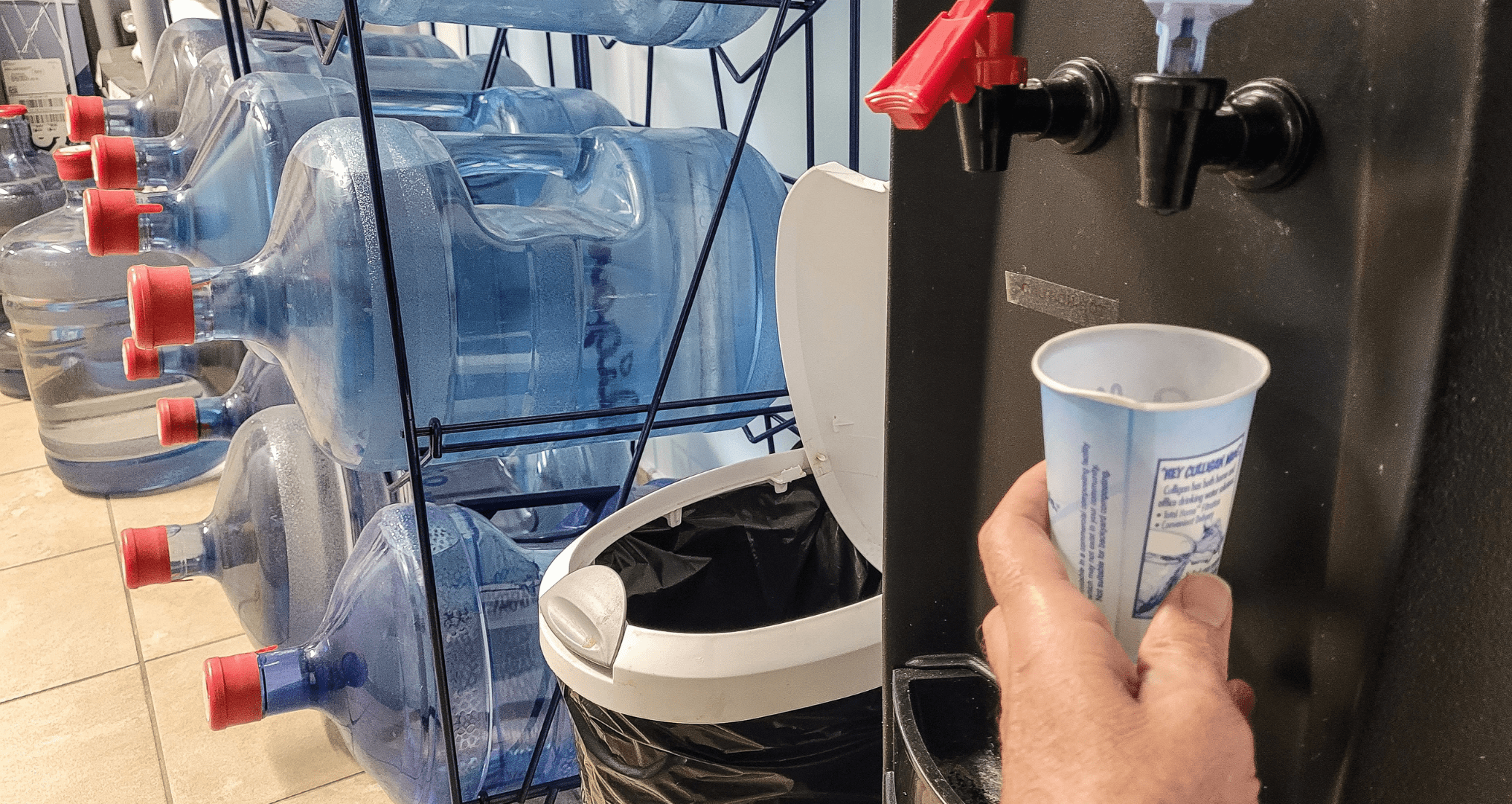 plastic jug water cooler in office - a sign you’re ready to go bottleless