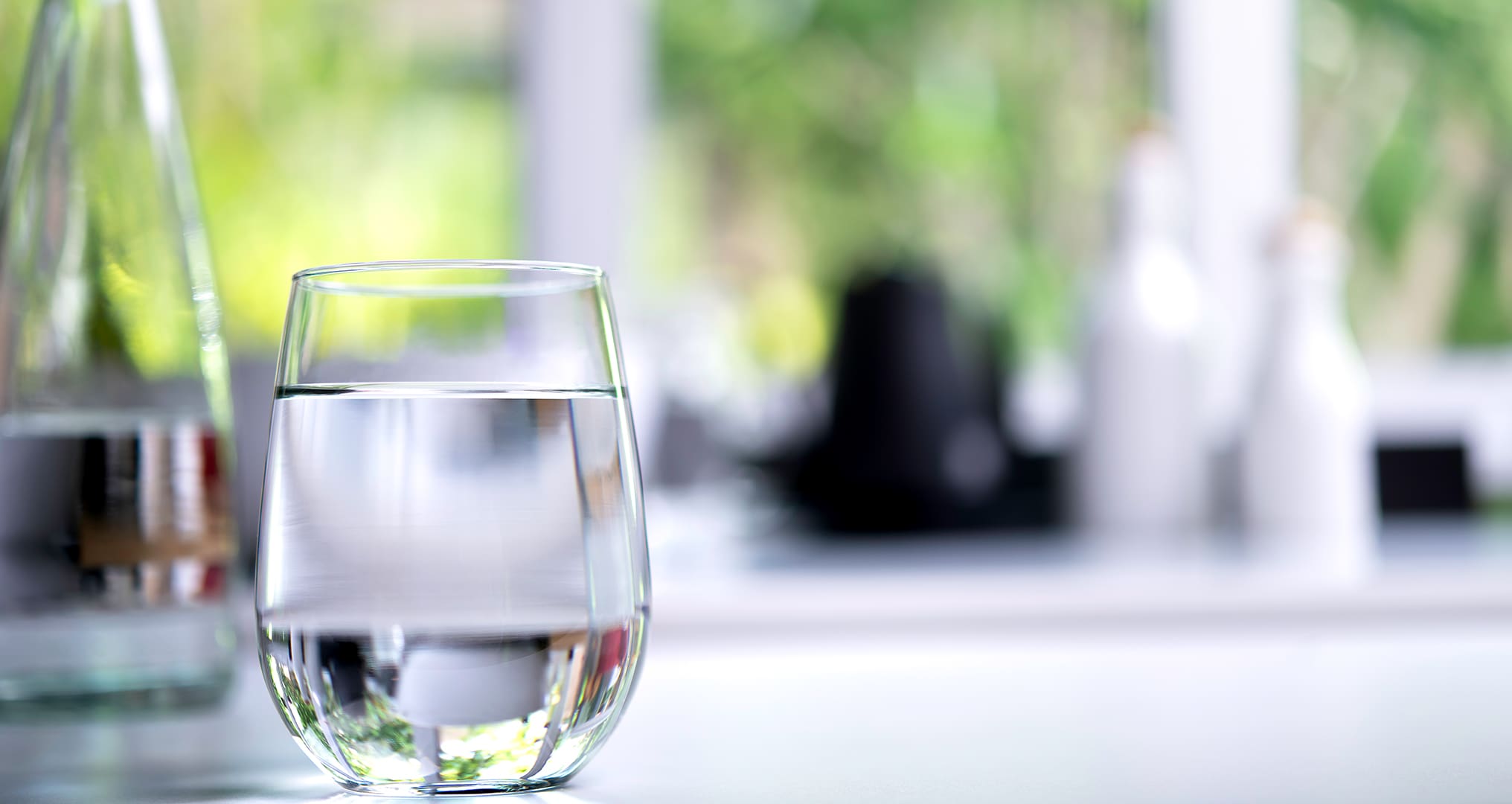 glass of fresh water on table