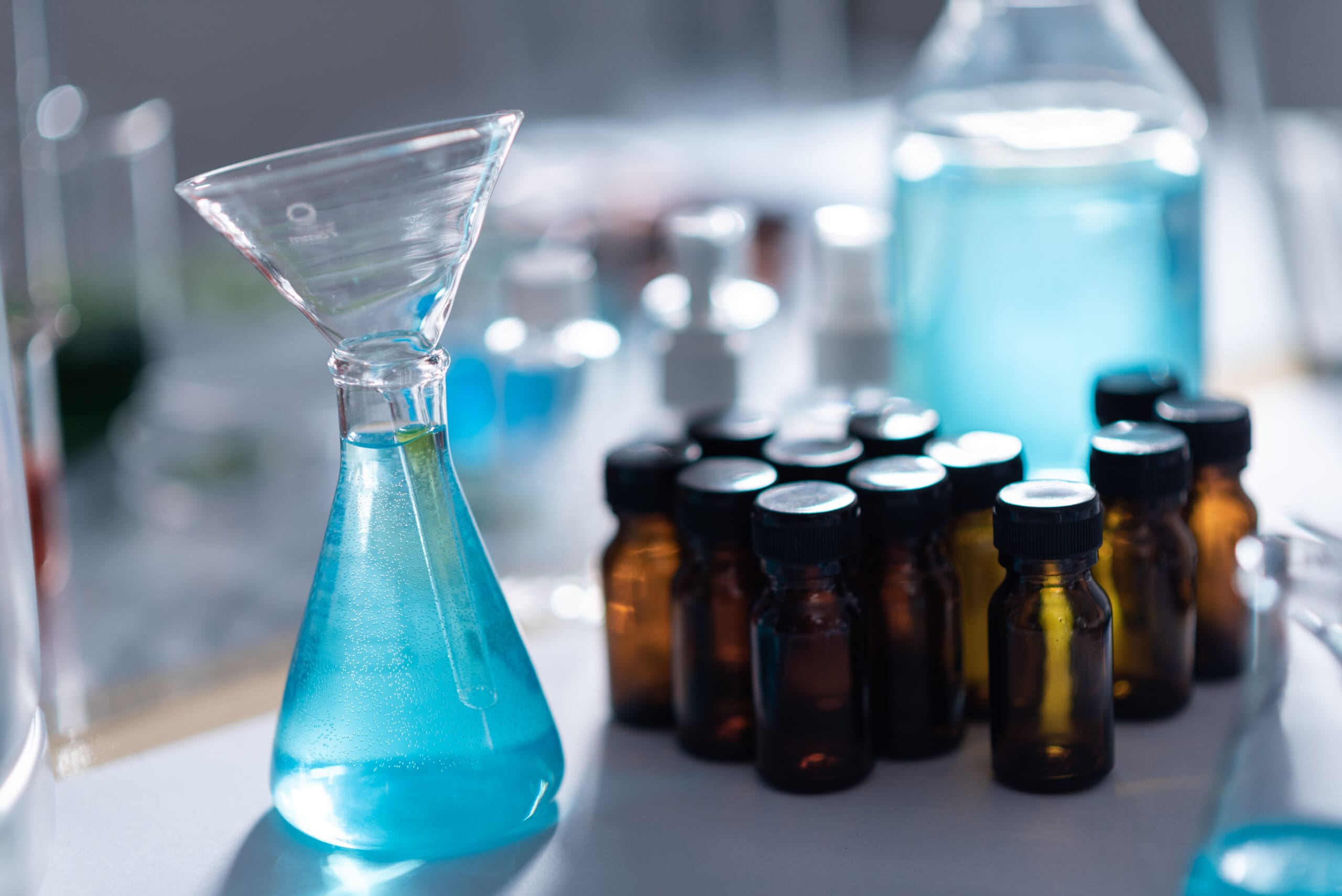 Pharmaceutical lab chemicals in beakers