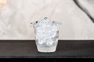 Ice bucket with ice cubes