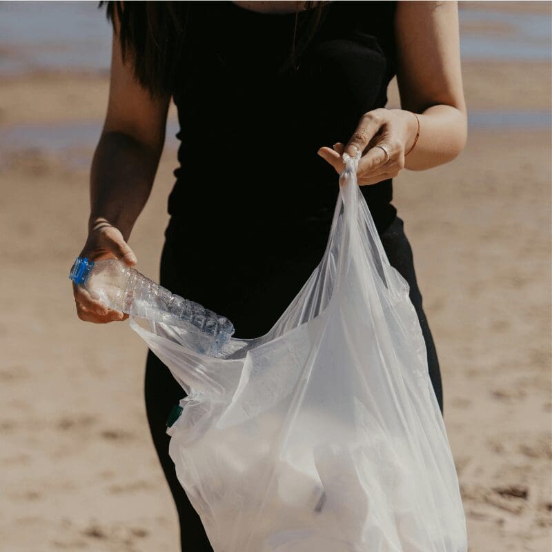picking up plastic trash on the beach (1) picking up plastic trash on the beach