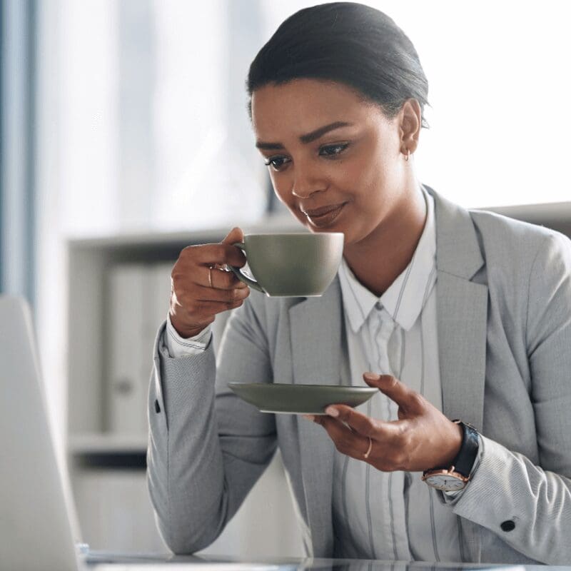 coffee-keeps-me-going-on-my-busy-days- woman having cup of coffee
